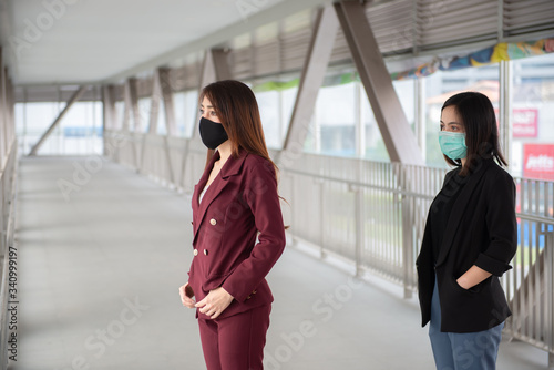 Asian woman wear face mask for protect COVID-19 virus Thailand people social distancing