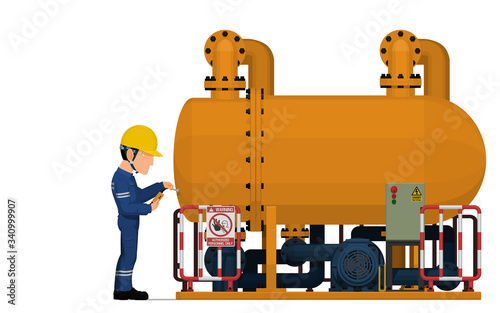 An industrial worker is inspecting the corrosion of heat exchanger.