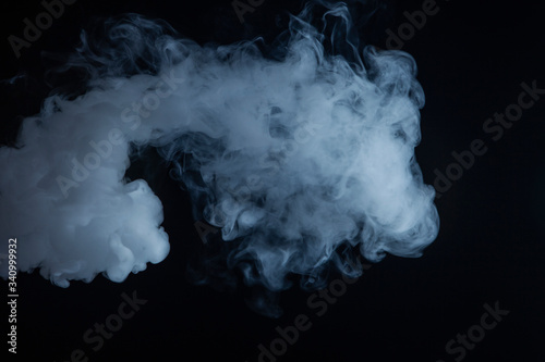 Cloud of vapor. Dark blue background