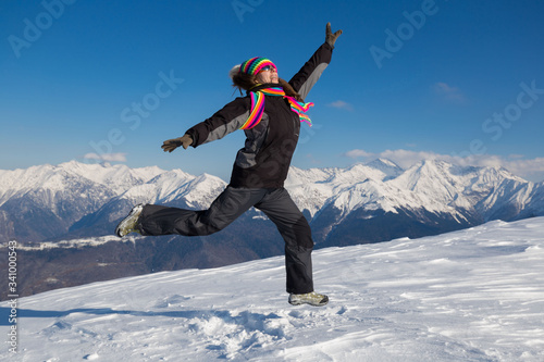 A woman in mountain day winter