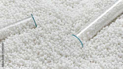 Closeup of a granule of white plastic polymer