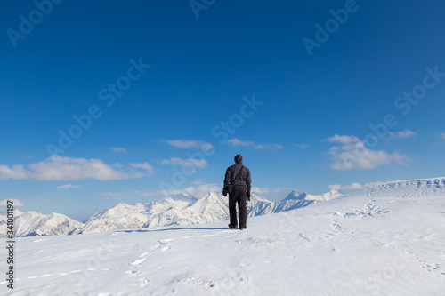 A man in mountain day winter © erainbow