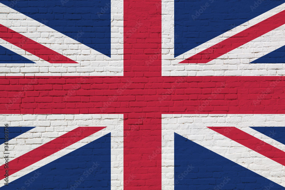Fototapeta premium United Kingdom flag painted on brick wall