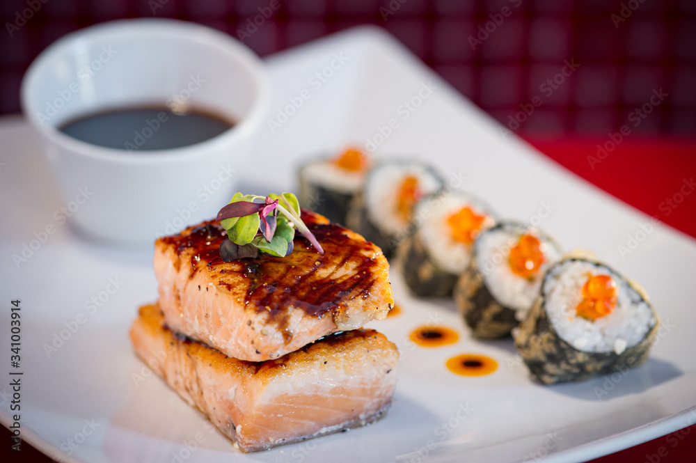 Grilled Salmon with Sushi Roll