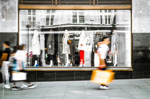 Photography Motion blurred people shoppers on busy street