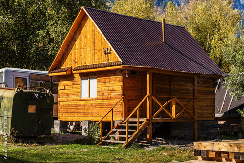 Wooden bathhouse at the camp site. Russia, Altai Republic, Ulagansky District, Lake Teletskoye, Cape Kirsay