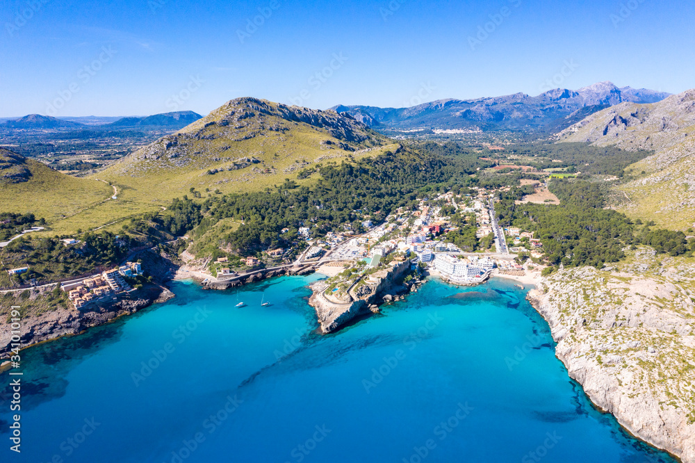 Fototapeta premium Cala San Vicente on a wonderful sunny day with crystal clear waters.