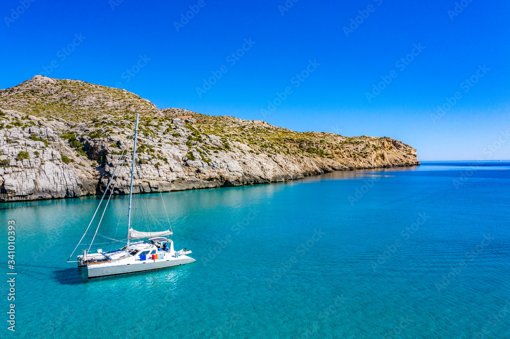Cala San Vicente on a wonderful sunny day with crystal clear waters.
