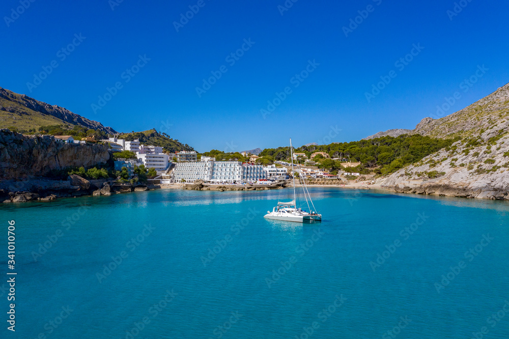 Cala San Vicente on a wonderful sunny day with crystal clear waters.