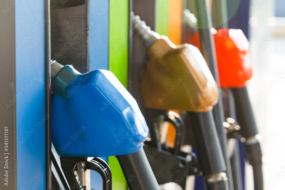 Gas station Fuel pump.Colorful Petrol pump filling nozzles in gas petrol filling station.