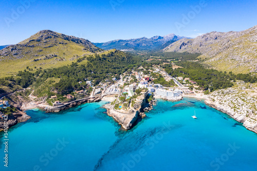 Cala San Vicente on a wonderful sunny day with crystal clear waters.