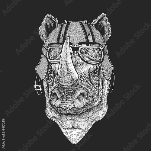 Rhinoceros, rhino portrait. Vintage motorcycle leather helmet. Head of wild animal.