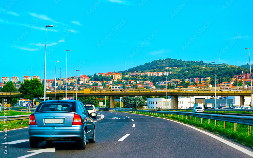Car in highway road in Slovenia bridge reflex