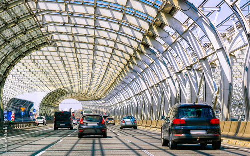 Car traffic at tunnel bridge in Warsaw in Poland reflex