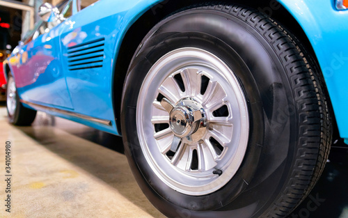 Wheel of blue vintage classic car auto reflex © Roman Babakin