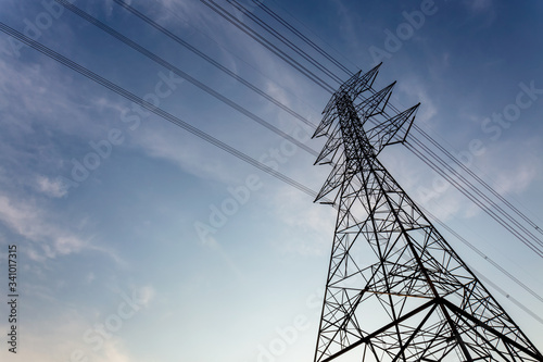 electricity high voltage pole tower sky background.