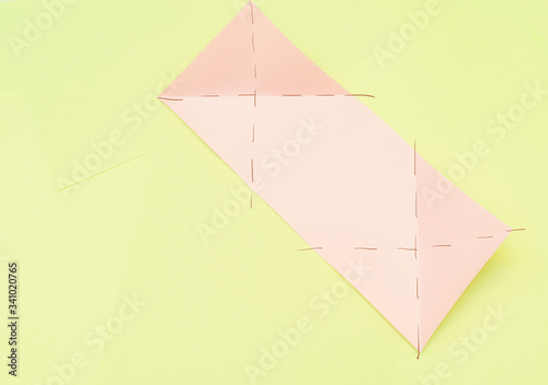 Origami pink heart on a green background, step by step instructions. as great idea for a hand made diy Valentine s Day, Mothers day gift. Step 5