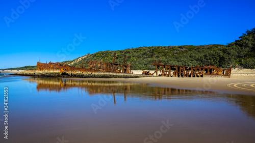 Colourful Maheno Wreck view from low tide on Fraser Island, Queensland, Australia