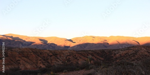 sunset over the desert mountains