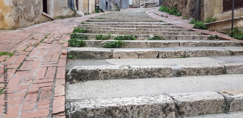 Panorama of empty, old, stone steps in the ancient city.