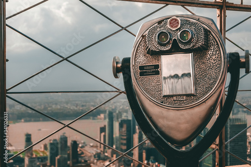 New York City, NY, USA - 04/16/2019: 
Lookout binoculars at the top of the Empire state building