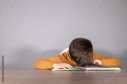 Картината върху платно Angry schoolboy with learning difficulties