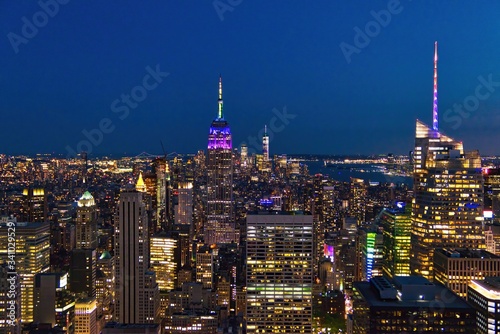 Empire State Building at night in New York City. It is a 102-story landmark and was world's tallest building for more than 40 years.
