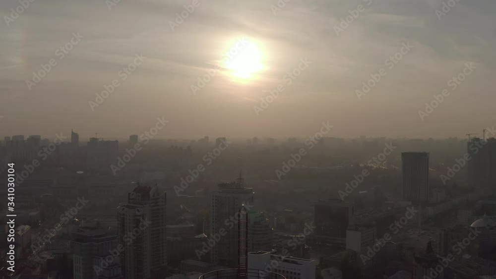 silhouette of a roof spire, lightning rod in a skyscraper. against the backdrop of sunset and evening city center silhouette of a roof spire, lightning rod in a skyscraper. against the backdrop of sunset and evening city center