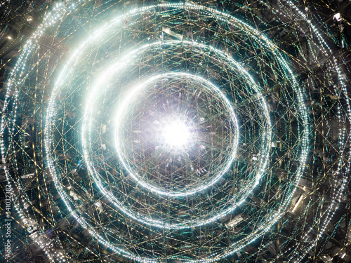 An abstract white light image showing a piece of artificial intelligence as a shining eye. A concept representing powerful technology that seems like it's from another planet 