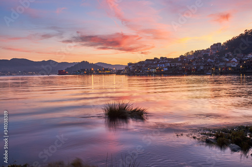 Sunset in the fishing village of Combarro in Galicia, Spain. photo