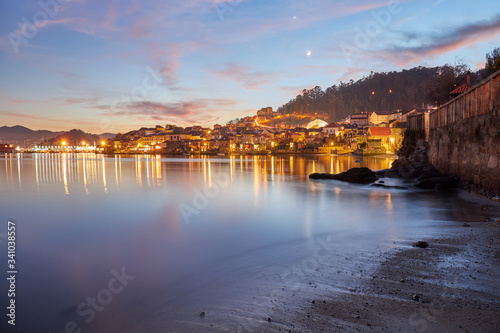 Sunset in the fishing village of Combarro in Galicia, Spain. photo