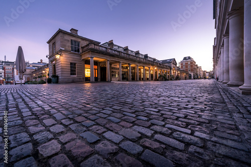 LONDON, UK - 30 MARCH 2020: Empty streets in Covent Garden, London City Centre during COVID-19, lockdown during coronavirus photo