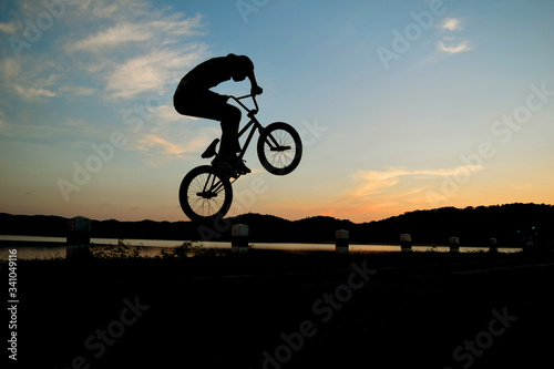 Canvas Print Silhouette Of Man On Bmx Bicycle