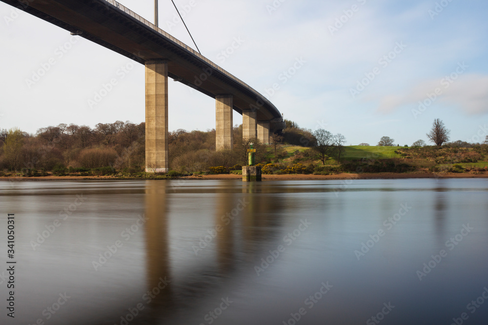 A view of the Erskine bridge over the river clyde on a spring morning in Scotland.
