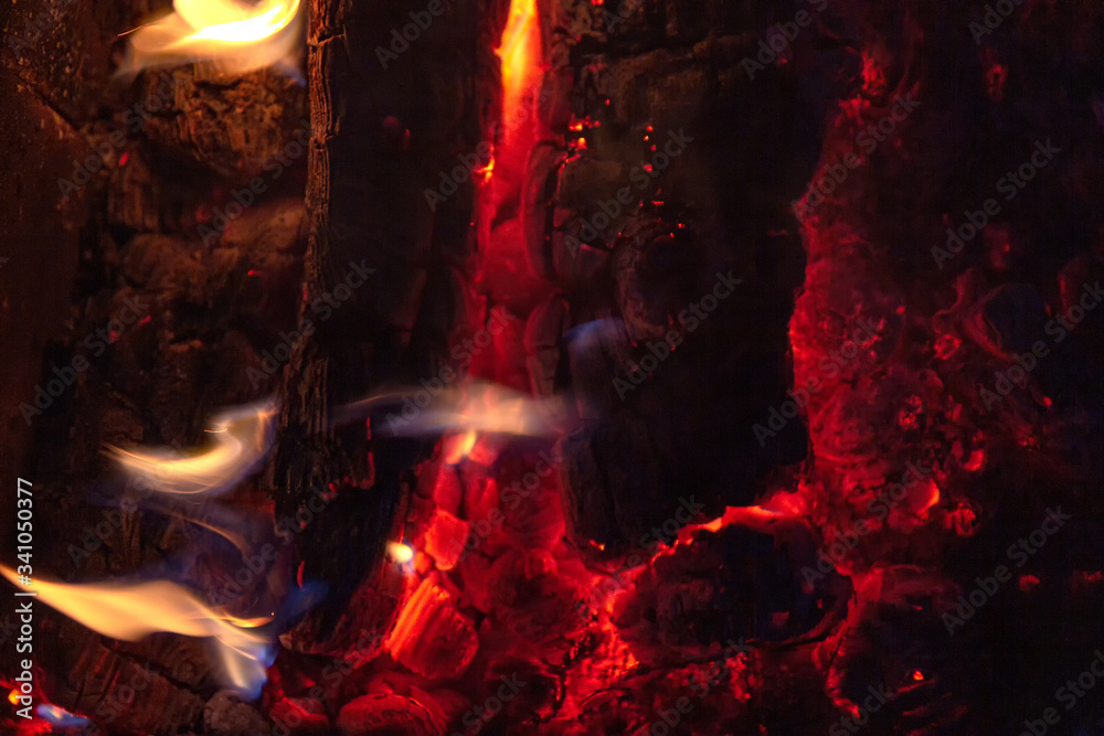 Coals in a campfire blurry close up with long exposure Coals in a campfire blurry close up with long exposure
