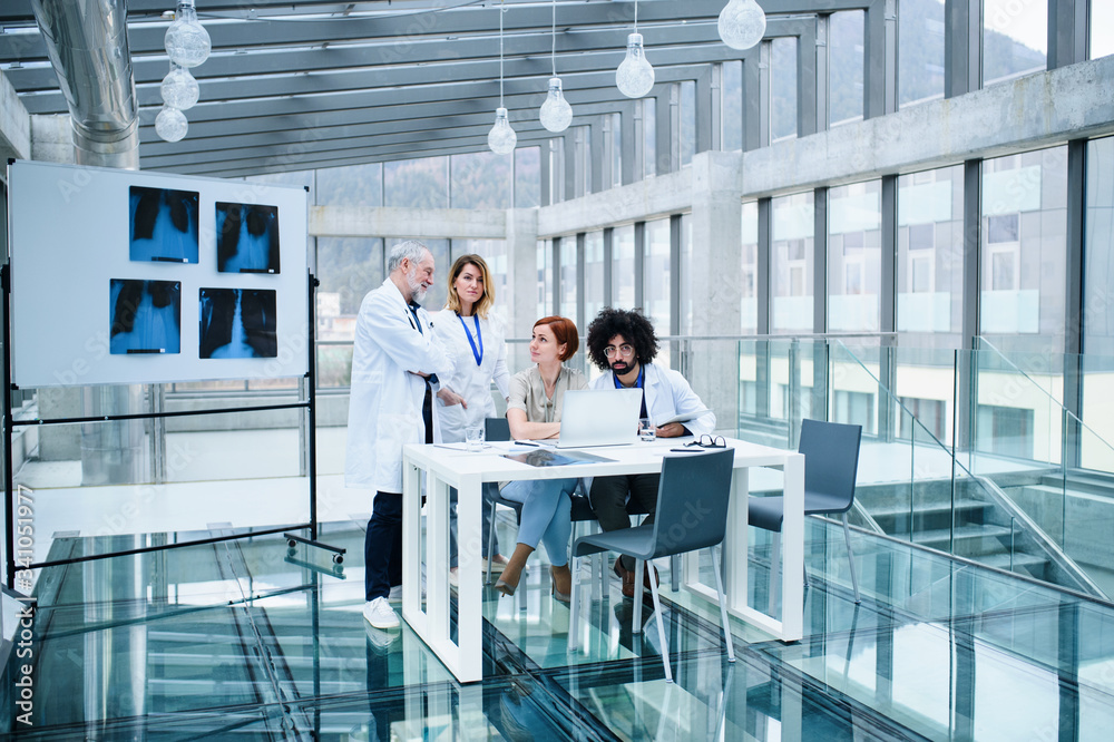 Group of doctors talking about corona virus on conference. Group of doctors talking about corona virus on conference.