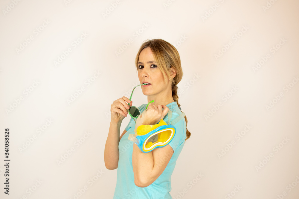 Woman with diving glasses on summer vacation Woman with diving glasses on summer vacation