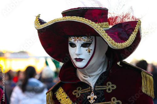 VENICE CARNIVAL: close-up of beautiful and colorful mask during the carnival.