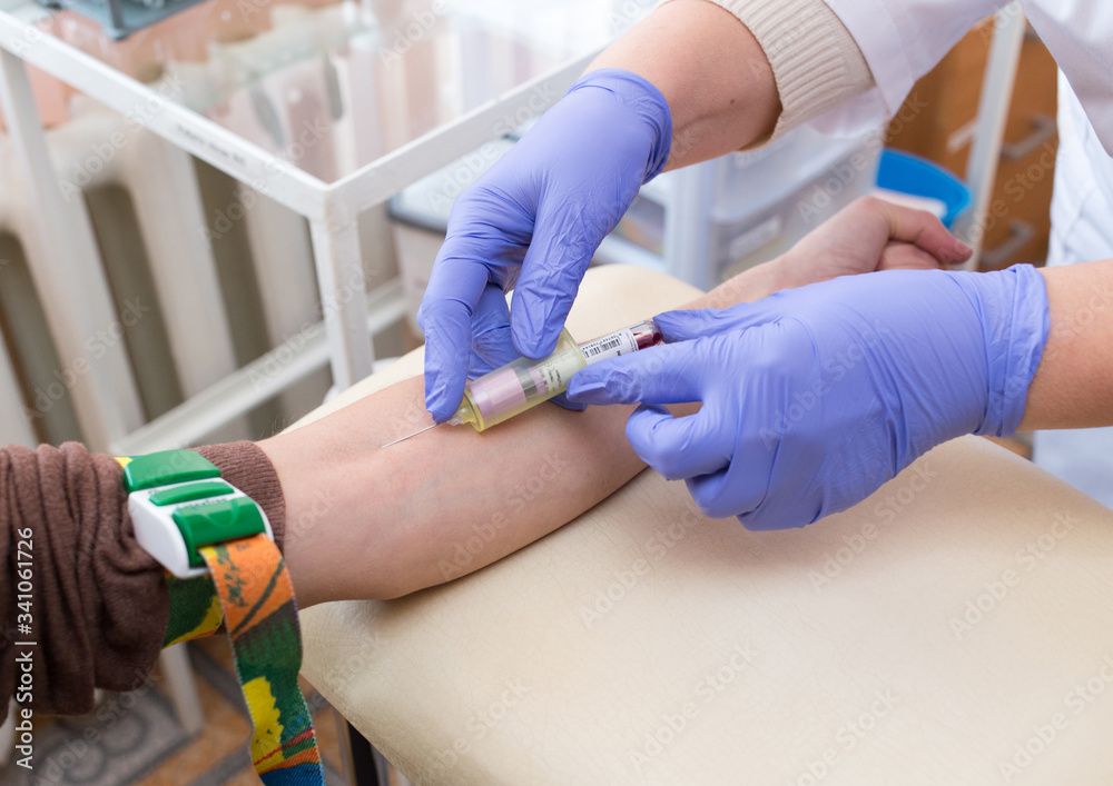 Obraz premium blood sampling from a vein