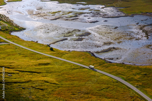 Wallpaper Mural truck on the road near the sea, Lofoten islands, sunny evening Torontodigital.ca