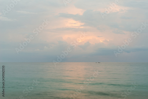 Landscape of sunset at Nai Yang Beach, Phuket, Thailand. © wuttichok