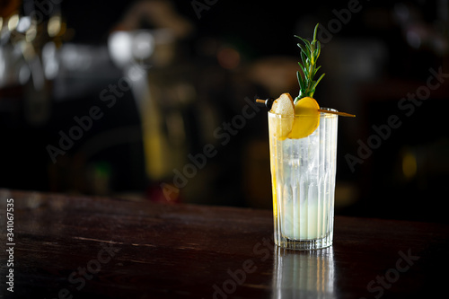 Screwdriver cocktail on the bar. Night club scenery. photo