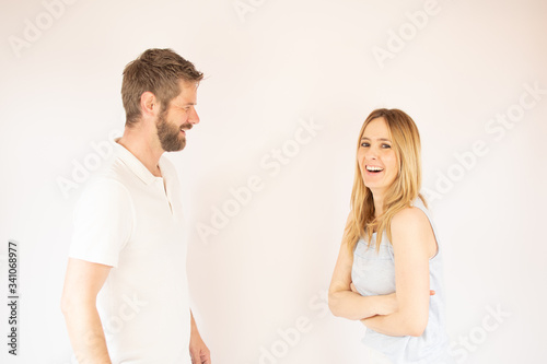 Handsome couple laughing together with love