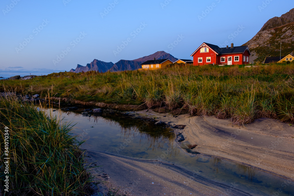 view of a village in norway, rorbu and fjords lofoten islands view of a village in norway, rorbu and fjords lofoten islands