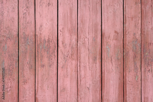 Texture Of Narrow pastel red Boards. Old Weathered Shabby pink Wooden Background. Design element, pink wooden fence.