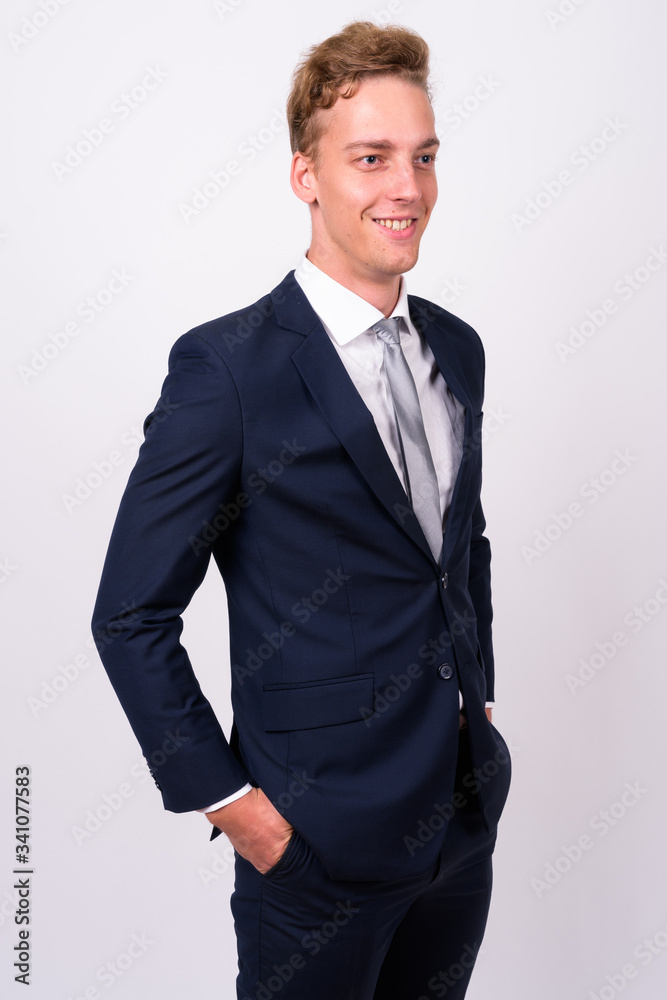 Young handsome Scandinavian businessman against white background Young handsome Scandinavian businessman against white background