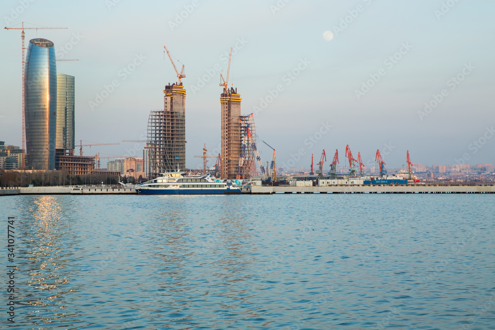 Panoramic view of the Caspian Sea in Baku. Panoramic view of Baku, Azerbaijan, skyline with historical and modern architecture. A bird's-eye view. Caspian Sea coast in Baku . Panoramic view of the Caspian Sea in Baku. Panoramic view of Baku, Azerbaijan, skyline with historical and modern architecture. A bird's-eye view. Caspian Sea coast in Baku .