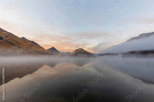 New Zealand, Oceania, South Island, Otago, Closeburn, Moke Lake in morning fog photo