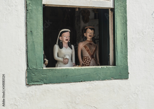 Bride art at the windows, very common in the streets of old town Tiradentes, Minas Gerais, Brazil.