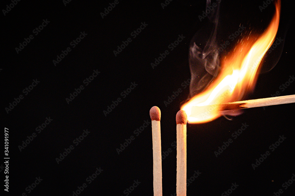 Burning flame to a matchstick Burning flame to a matchstick